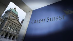 Credit Suisse, Swiss banks, investment banking, wealth management, financial services, global presence, restructuring, risk management, profitability, scandals, legal issues, Archegos Capital Management, Greensill Capital, net loss, cost-cutting, high net worth individuals, institutions